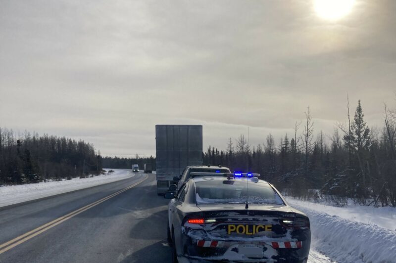 Picture of an OPP cruiser and a truck pulled over on Highway 11 in Ontario