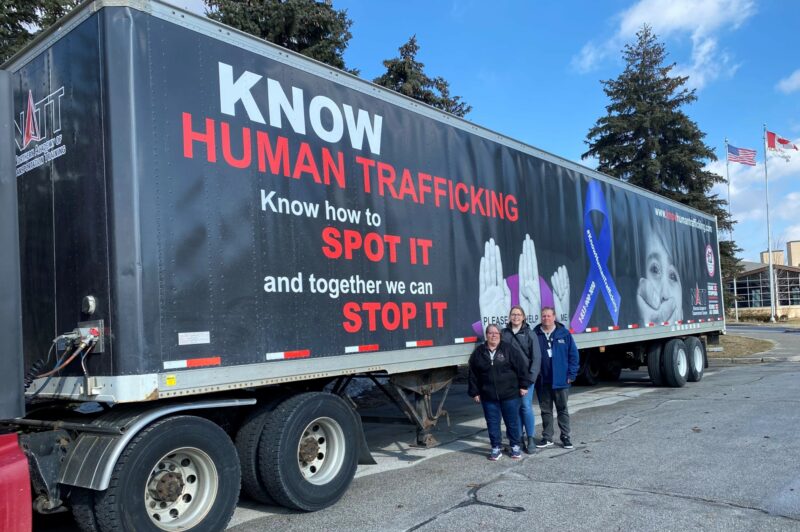 Picture of a trailer wrapped in anti-human trafficking messaging