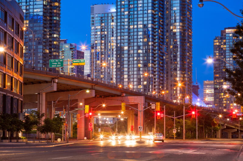 Cars on Lake Shore Boulevard below the Gardiner Expressway in downtown Toronto.