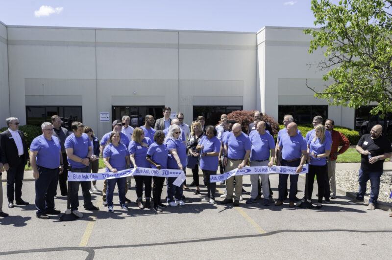 Picture of people standing in front of a building