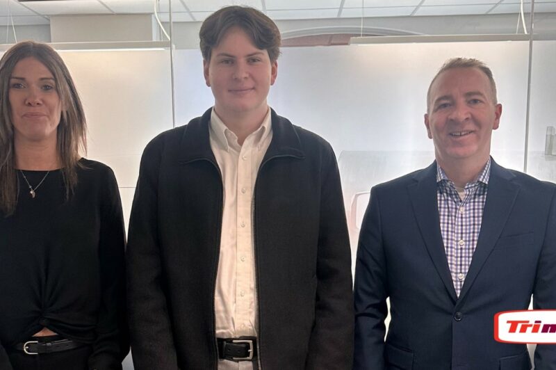 Picture of three people standing