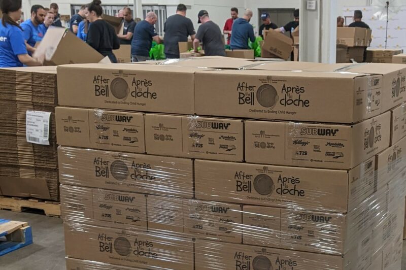 Picture of a pallet with people in the background