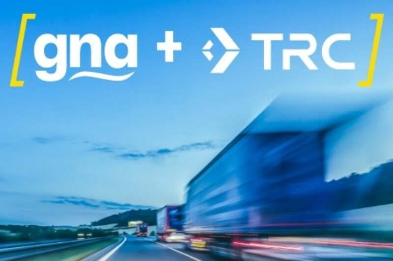 Picture of trucks on a road with GNA and TRC superimposed on the image.