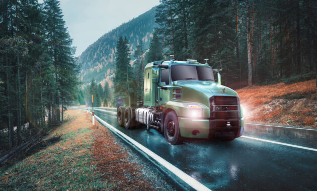 Blurred car in motion on the road in autumn forest in rain. Perf alternate text for this image