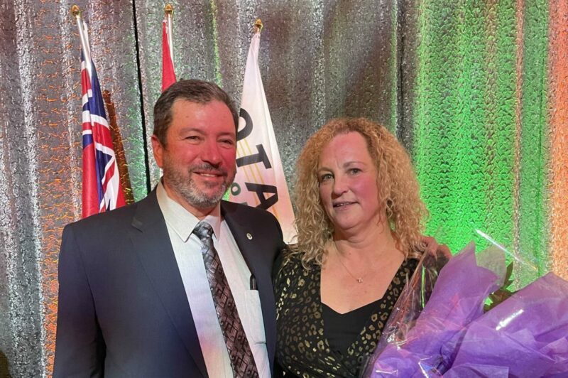 The image is of Dawna Jacobsen and Erb Transport CEO, Wendell Erb