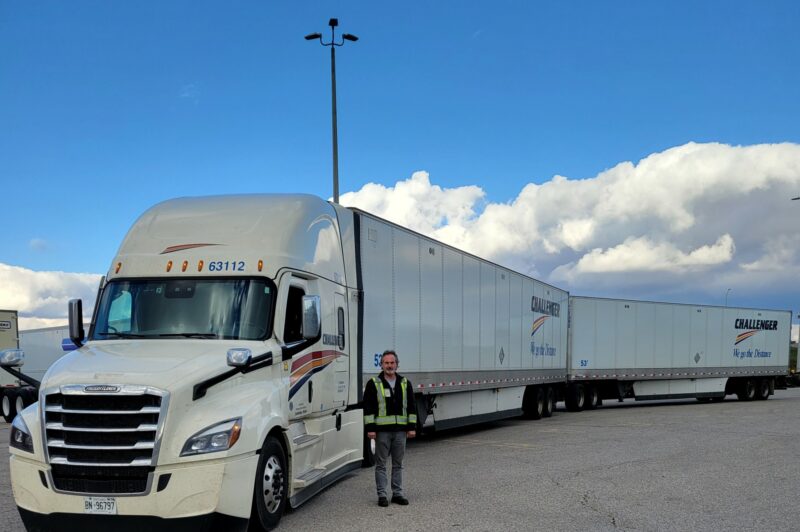 Jeff Dyksterhusis next to a LCV
