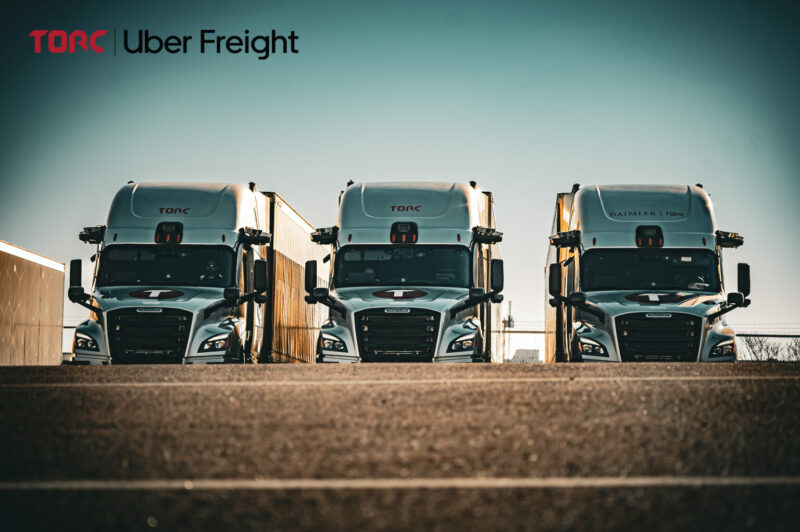 Torc trucks in a parking lot
