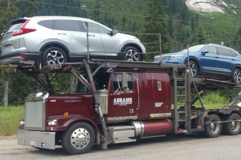 The photo is of Abrams Auto Transport's tow truck
