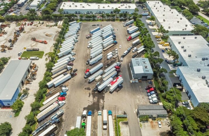 Overhead picture of trucks parked at a truck stop.
