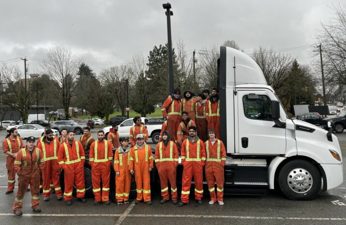 VCC students with a Freightliner eCascadia truck