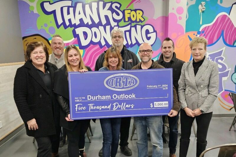 DRTA presented 2023 donation to Durham Outlook for the Needy.