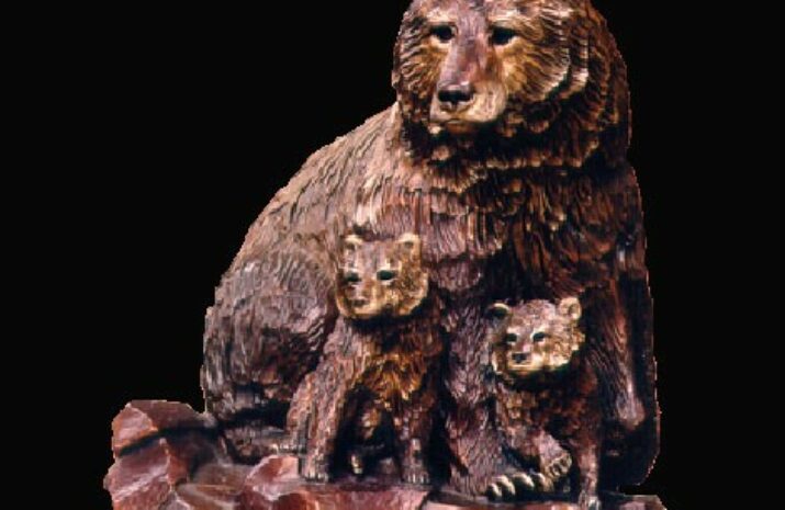 The image is of the award in the shape of the bear and two of its cubs made out of metal
