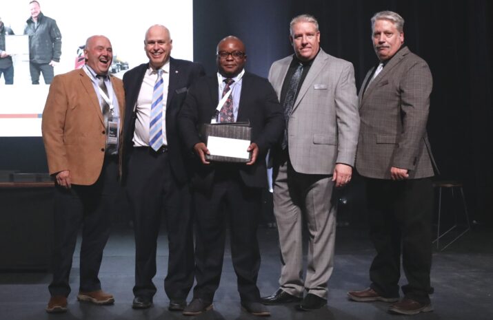 Men on stage during the AMTA awards
