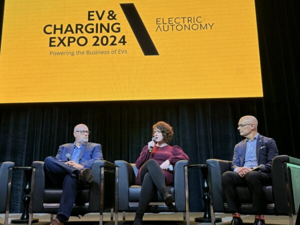 Left to right: Chris Henry, fleet director at Purolator; Gabriela Favaron, EV infrastructure director at 7Gen; Robert Safrata, CEO, Noxev Delivery Solutions on the stage