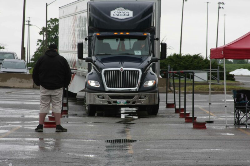 Canada Cartage truck on track