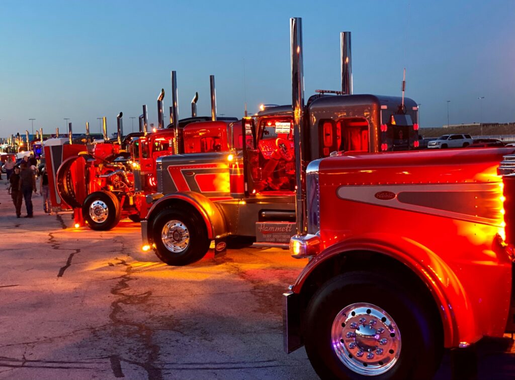 Trucks lit up in a parking lot