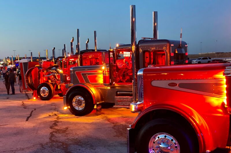 Trucks lit up in a parking lot