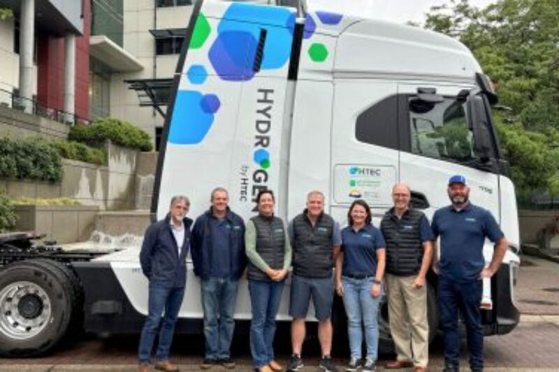 From left to right: Patric Ouellette, vice-president of stations and distribution; Kurt Loewen, chief financial officer; Shannon Halliday, vice-president of corporate affairs; Gerhard Schmidt, vice-president of engineering; Sabina Russell, vice-president of clean fuels; Colin Armstrong, president and CEO; and Jeff Grant, vice-president of transportation solutions, stand in front of HTEC’s first hydrogen fuel cell electric truck as the company commemorates its 20th anniversary.