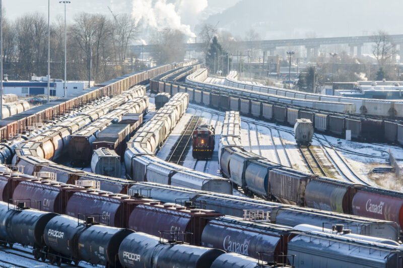 CN Rail Locomotive and mixed freight cars.