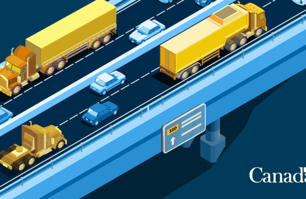 A highway featuring cars and trucks.