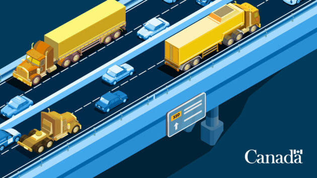 A highway featuring cars and trucks.