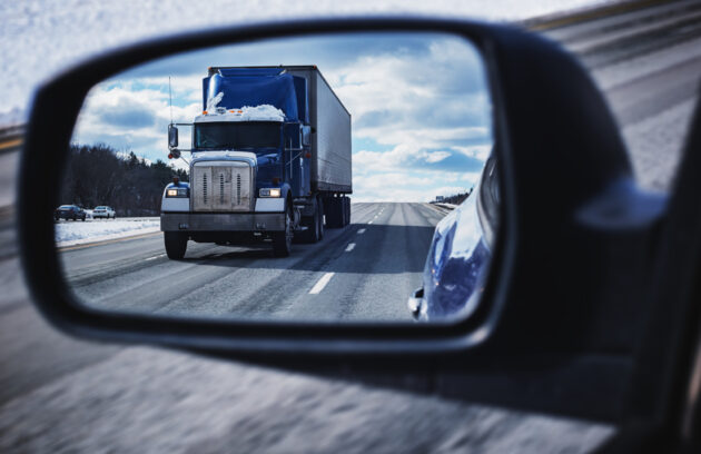 Semi Truck in Mirror alternate text for this image