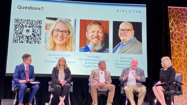 People sitting and talking on a stage
