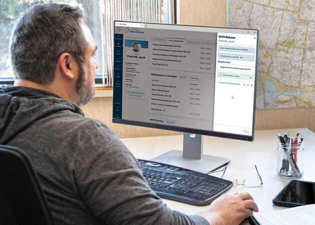photo shows Fleet Manager at Computer