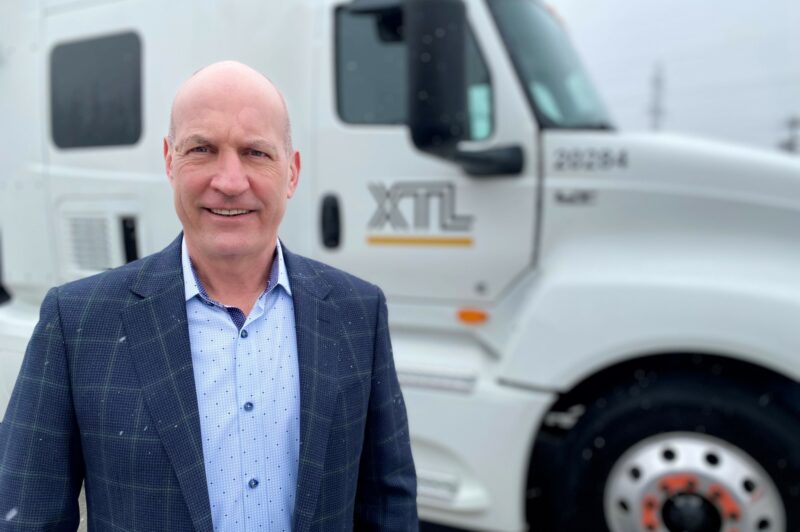 Craig Germain in front of XTL truck