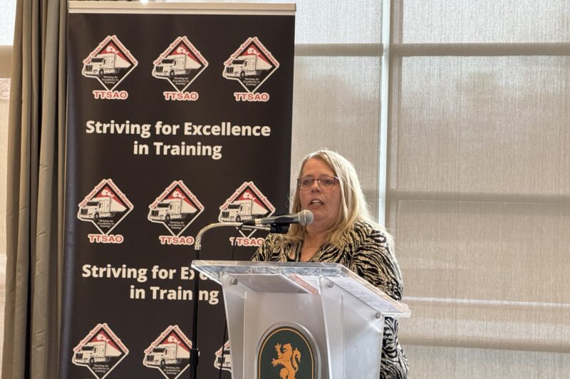 Shelley Walker at the podium during conference