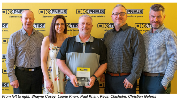 OK Tire Baden team with the award
