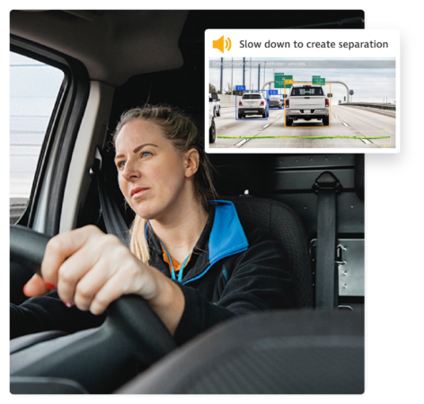 Female truck driver behind the wheel