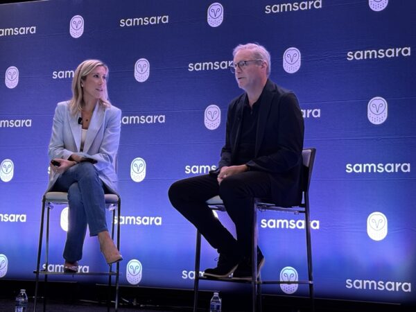 Chris Spear photo, on stage with Meagen Eisenberg, CMO of Samsara