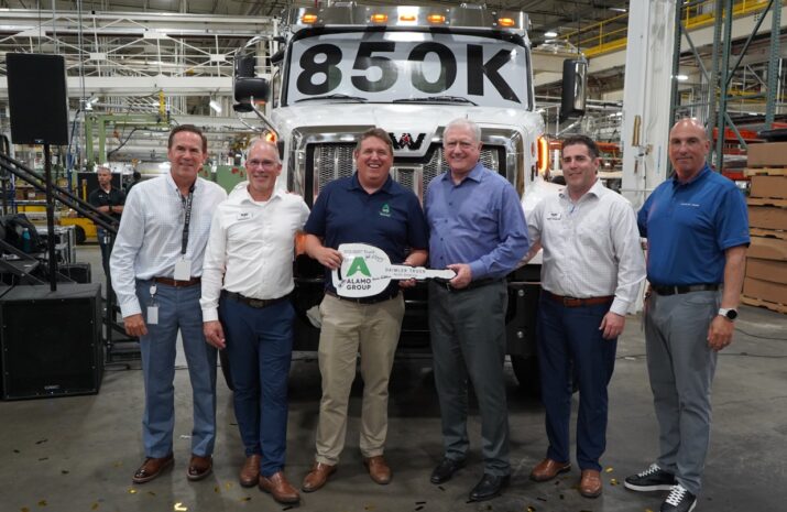 Picture of men in front of a Western Star truck
