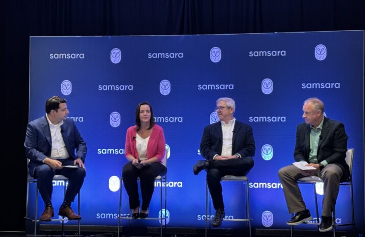 Four panelists sitting on stage during the conversation