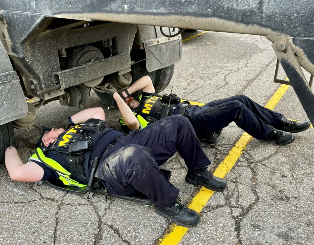 MTO officers inspecting a truck