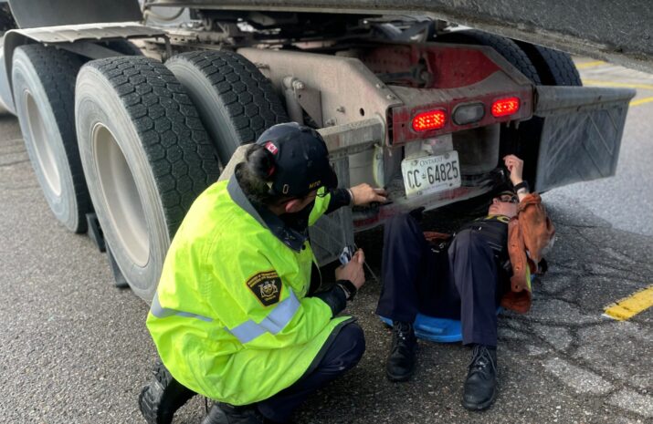 MTO officers inspecting a truck