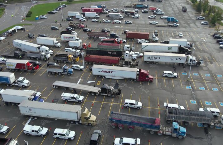 Picture of trucks being inspected