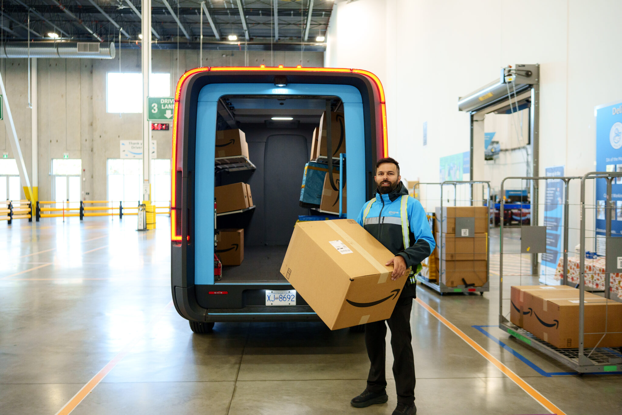 Amazon Rivan electric delivery van on a loading dock