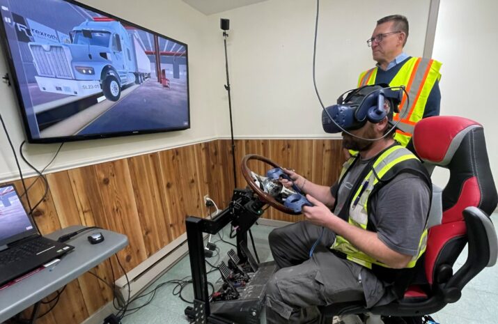 Picture of Todd Seward and an employee undergoing VR training