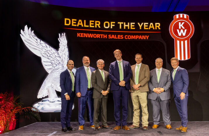 Picture of men on a stage
