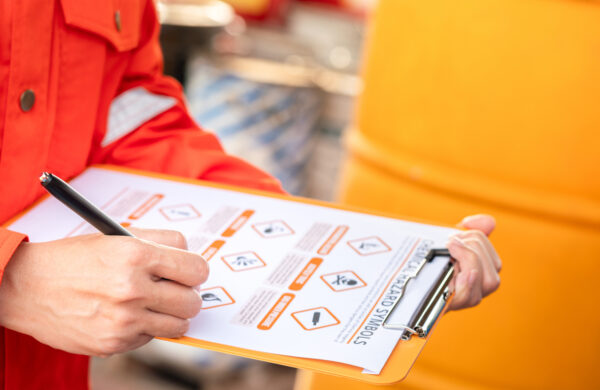 Picture of a person with a clipboard