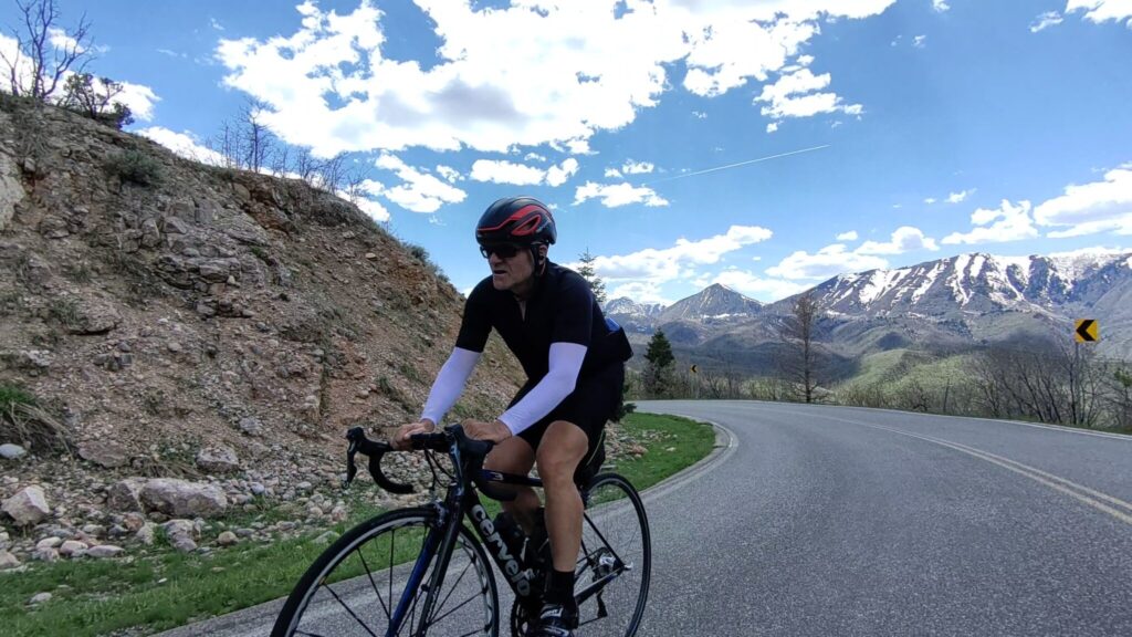 Picture of Shawn Cranwell biking in the mountains