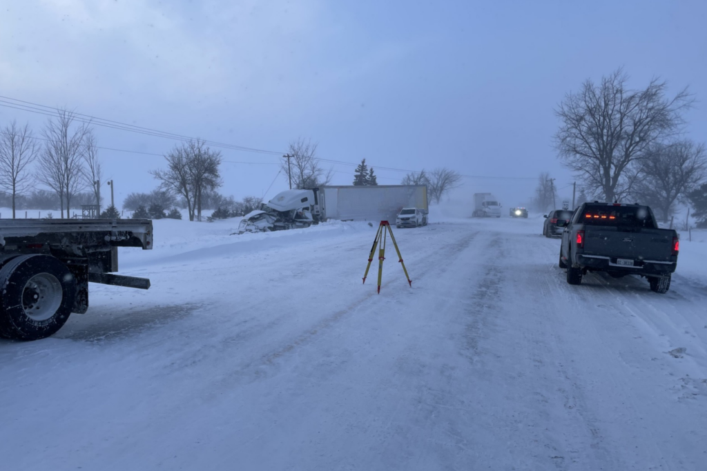 Picture of a crashed truck on the side of the road