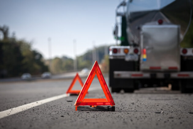 Warning Reflectors On Highway Indicating Disabled Truck alternate text for this image