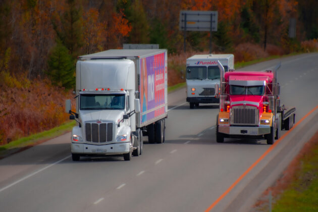 Heavy truck traveling on a Canadian highway in the province of Quebec