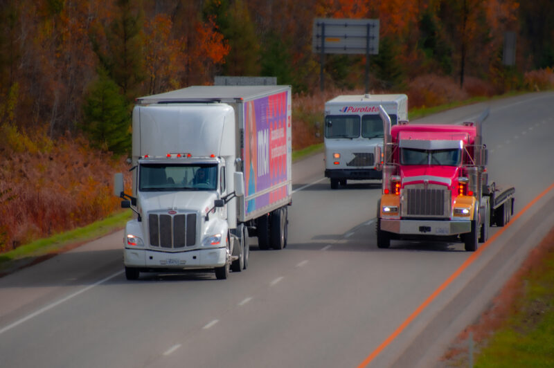 Heavy truck traveling on a Canadian highway in the province of Quebec
