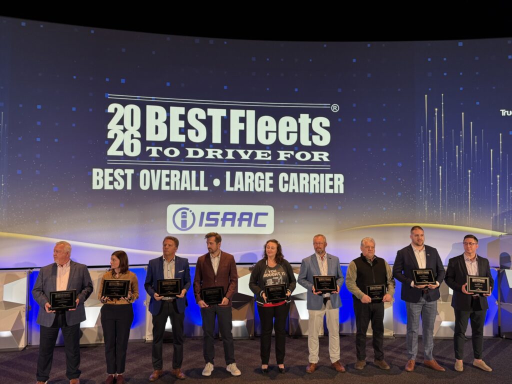 fleet representatives on stage, holding awards, group photo