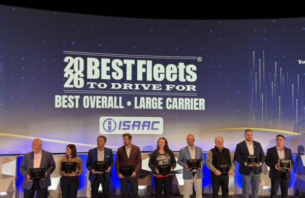 fleet representatives on stage, holding awards, group photo