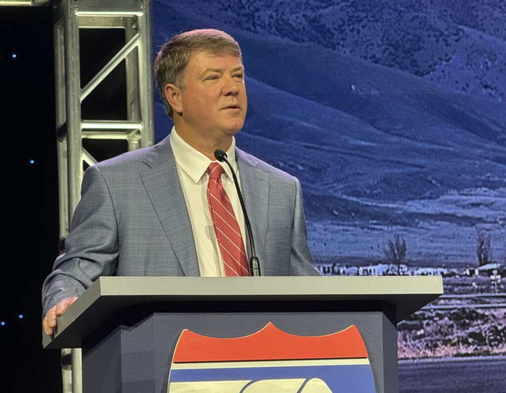 Jim Mullen at the podium addressing TCA attendees